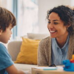 compassionate latino therapist with autism child