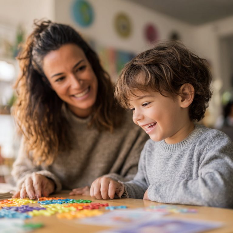 Child with autism working with therapist in a supportive environment using ABA, speech, and occupational therapy at Mireles Autism & Behavioral Center in South Texas